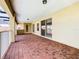 Spacious balcony with brick flooring and access to the outdoors at 880 Spinnaker Way, Kissimmee, FL 34746