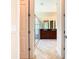 Elegant bathroom with double vanity, large shower, and tile floors at 880 Spinnaker Way, Kissimmee, FL 34746