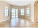 Breakfast nook with sliding doors leading to pool area at 880 Spinnaker Way, Kissimmee, FL 34746