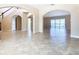 Bright and spacious entrance with high ceilings and tile flooring at 880 Spinnaker Way, Kissimmee, FL 34746