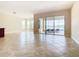 Living room with sliding doors to access the pool area at 880 Spinnaker Way, Kissimmee, FL 34746