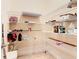 Walk-in pantry with wire shelving for ample storage space at 880 Spinnaker Way, Kissimmee, FL 34746
