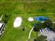 Aerial view of playground with sand volleyball court at 880 Spinnaker Way, Kissimmee, FL 34746