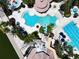Aerial view of resort-style pool with lap lanes and water slide at 880 Spinnaker Way, Kissimmee, FL 34746