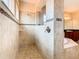 Large walk-in shower with tile surround and bench at 880 Spinnaker Way, Kissimmee, FL 34746