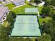 Aerial view of tennis and basketball courts at 880 Spinnaker Way, Kissimmee, FL 34746
