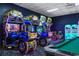 Modern game room with racing games and pool table at 8963 Coco Palm Rd, Kissimmee, FL 34747