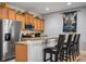 Modern kitchen with granite countertops and stainless steel appliances at 8963 Coco Palm Rd, Kissimmee, FL 34747