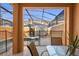 Private screened pool and patio area with seating at 8963 Coco Palm Rd, Kissimmee, FL 34747