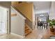 Elegant staircase connecting the entryway to the upper level of the home at 8963 Coco Palm Rd, Kissimmee, FL 34747