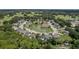 Aerial view of community with pond and surrounding houses at 102 Circle Hill Rd, Sanford, FL 32773