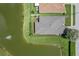 Aerial view of house on a lake with a large backyard at 102 Circle Hill Rd, Sanford, FL 32773