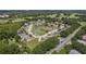 Aerial view of a residential neighborhood with a golf course nearby at 102 Circle Hill Rd, Sanford, FL 32773
