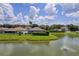 Backyard of home backing up to a pond with fountain at 102 Circle Hill Rd, Sanford, FL 32773