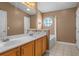 Clean bathroom with double vanity and a soaking tub at 102 Circle Hill Rd, Sanford, FL 32773