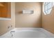 Bathroom featuring a garden tub and a wall-mounted shelf at 102 Circle Hill Rd, Sanford, FL 32773