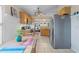 Kitchen with stainless steel appliances and light wood cabinets at 102 Circle Hill Rd, Sanford, FL 32773