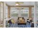 Sunroom with seating area and art supplies at 102 Circle Hill Rd, Sanford, FL 32773
