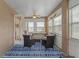 Bright sunroom features ample natural light and comfortable seating at 102 Circle Hill Rd, Sanford, FL 32773