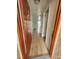Open entryway with wood-look floors leading into the condo at 10232 Turkey Lake Rd # 181, Orlando, FL 32819