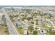 Wide aerial view of the neighborhood, highlighting the property's location and surroundings at 103 Vega Ct, Davenport, FL 33896