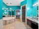 Relaxing bathroom with soaking tub, shower, and double vanity at 103 Vega Ct, Davenport, FL 33896
