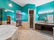 Spa-like bathroom with a large tub and double vanity at 103 Vega Ct, Davenport, FL 33896