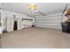 Spacious garage with ample storage at 103 Vega Ct, Davenport, FL 33896