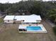 Aerial view of house, pool, and large backyard at 1085 Old Hickory Tree Rd, St Cloud, FL 34771
