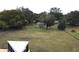Large backyard with chain link fence and a detached shed at 1085 Old Hickory Tree Rd, St Cloud, FL 34771