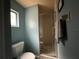 Clean bathroom with shower stall, toilet and single sink vanity at 1085 Old Hickory Tree Rd, St Cloud, FL 34771
