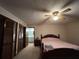 Bedroom with double bed, closet and bathroom access at 1085 Old Hickory Tree Rd, St Cloud, FL 34771