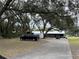 Long driveway leading to the house at 1085 Old Hickory Tree Rd, St Cloud, FL 34771