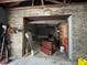 Brick garage with open door, showing various storage items at 1085 Old Hickory Tree Rd, St Cloud, FL 34771