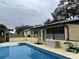 Relaxing pool area with patio and screen enclosure at 1085 Old Hickory Tree Rd, St Cloud, FL 34771
