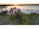 Lakeside property with sunset view and private dock at 1186 Laguna Cir, St Cloud, FL 34771