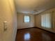 Spacious bedroom with wood floors and ceiling fan at 1186 Laguna Cir, St Cloud, FL 34771
