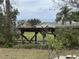Covered boat storage area with a partially visible boat at 1186 Laguna Cir, St Cloud, FL 34771