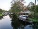 Waterfront property with covered boat slip and canal access at 1186 Laguna Cir, St Cloud, FL 34771