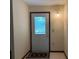 Light and airy entryway with a patterned rug at 1186 Laguna Cir, St Cloud, FL 34771