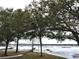 Scenic lakefront property with private dock and lush landscaping at 1186 Laguna Cir, St Cloud, FL 34771