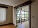 Living room features hardwood floors and sliding glass doors at 1186 Laguna Cir, St Cloud, FL 34771