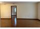 Spacious living room with wood floors at 1186 Laguna Cir, St Cloud, FL 34771
