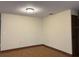 Spacious living room with hardwood floors and neutral walls at 1186 Laguna Cir, St Cloud, FL 34771