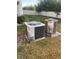 Two new AC units in the backyard at 14429 Wabasso Loop, Winter Garden, FL 34787