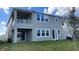 Two story house with a balcony and a spacious backyard at 14429 Wabasso Loop, Winter Garden, FL 34787