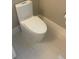 Clean bathroom with modern toilet and tile floor at 14429 Wabasso Loop, Winter Garden, FL 34787