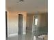 Bright hallway with doors to bedrooms and bathroom at 14429 Wabasso Loop, Winter Garden, FL 34787