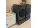 Laundry room with washer, dryer, and utility sink at 14429 Wabasso Loop, Winter Garden, FL 34787