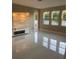 Spacious living room with large windows and gleaming floors at 14429 Wabasso Loop, Winter Garden, FL 34787